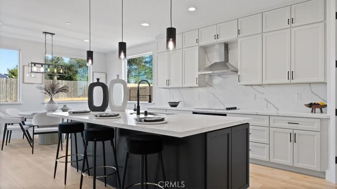 Interior, Kitchen, Marble Walls, Pendant Lights, Recessed Lighting, Stainless Steel Appliances, Wood Texture Flooring