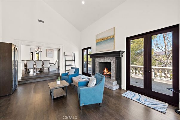 Chandelier, Dining room, Fireplace, Interior, Living room, Recessed Lighting, Wood Texture Flooring