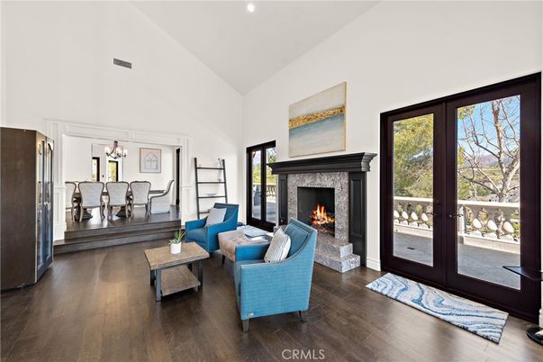 Chandelier, Fireplace, Interior, Living room, Recessed Lighting, Wood Texture Flooring