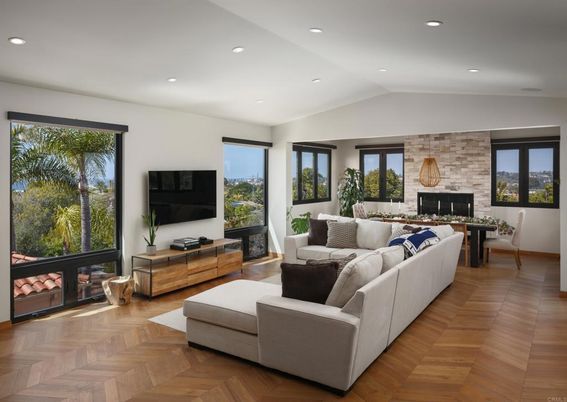 Dining room, Fireplace, Interior, Living room, Recessed Lighting, Stone Walls, Wood Texture Flooring