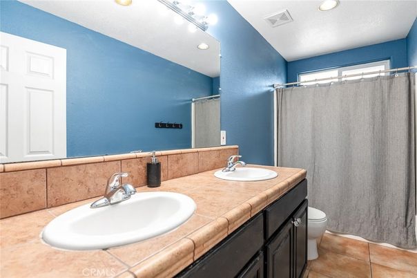 Bathroom, Dual Sink Vanities, Interior, Recessed Lighting, Tile Countertops