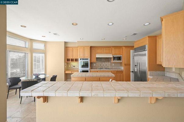 Dining room, Interior, Kitchen, Recessed Lighting, Stainless Steel Appliances, Tile Countertops