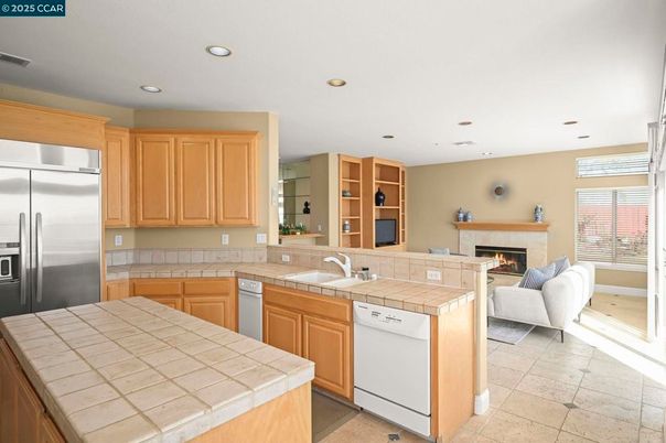 Fireplace, Interior, Kitchen, Living room, Recessed Lighting, Stainless Steel Appliances, Tile Countertops