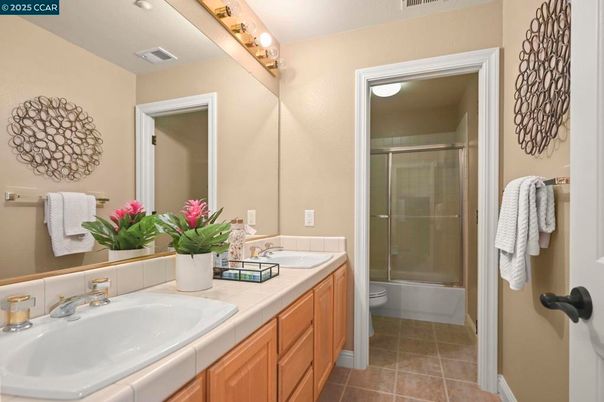 Bathroom, Dual Sink Vanities, Glass Shower, Interior, Tile Countertops
