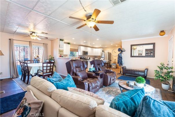 Dining room, Interior, Kitchen, Living room, Recessed Lighting, Stainless Steel Appliances, Wood Texture Flooring