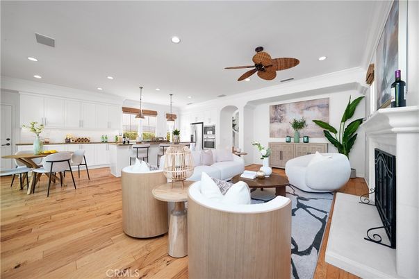 Dining room, Fireplace, Interior, Kitchen, Living room, Pendant Lights, Recessed Lighting, Stainless Steel Appliances, Wood Texture Flooring