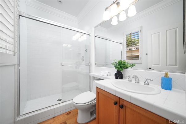 Bathroom, Glass Shower, Interior, Tile Countertops, Wood Texture Flooring