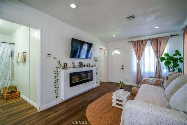 Fireplace, Interior, Living room, Recessed Lighting, Wood Texture Flooring