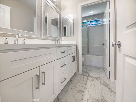 Bathroom, Dual Sink Vanities, Glass Shower, Interior, Marble, Recessed Lighting