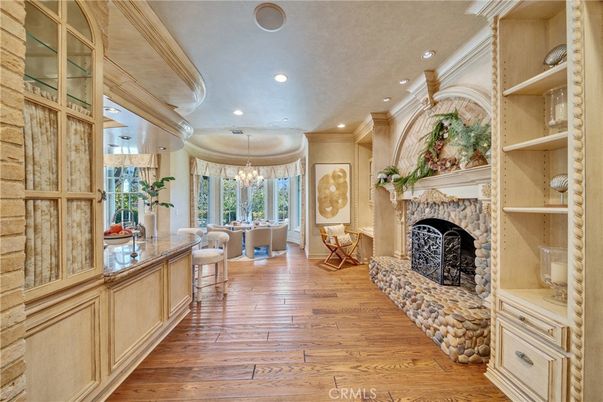 Chandelier, Dining room, Fireplace, Interior, Recessed Lighting, Wood Texture Flooring