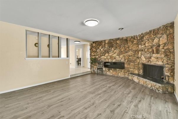 Empty room, Fireplace, Interior, Stone Walls, Wood Texture Flooring