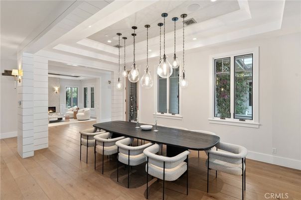 Dining room, Fireplace, Interior, Living room, Pendant Lights, Recessed Lighting, Wood Texture Flooring