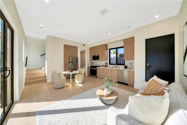 Dining room, Interior, Kitchen, Living room, Recessed Lighting, Stainless Steel Appliances, Wood Texture Flooring