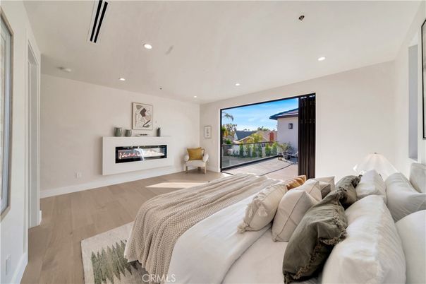 Bedroom, Fireplace, Interior, Recessed Lighting, Wood Texture Flooring