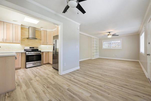 Empty room, Interior, Kitchen, Stainless Steel Appliances, Wood Texture Flooring