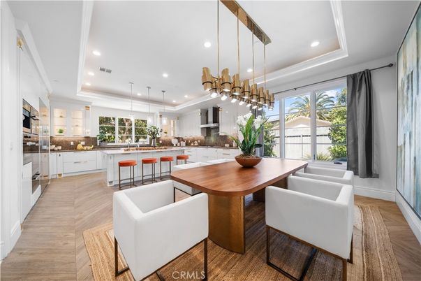 Dining room, Interior, Kitchen, Pendant Lights, Recessed Lighting, Stainless Steel Appliances, Wood Texture Flooring