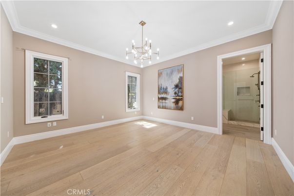 Bathroom, Chandelier, Empty room, Glass Shower, Interior, Pendant Lights, Recessed Lighting, Wood Texture Flooring
