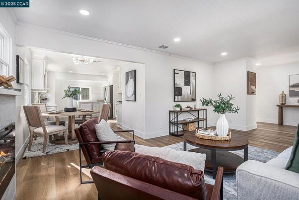 Dining room, Fireplace, Interior, Living room, Recessed Lighting, Wood Texture Flooring