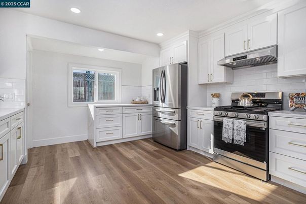 Interior, Kitchen, Recessed Lighting, Stainless Steel Appliances, Wood Texture Flooring