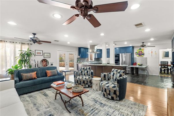 Dining room, Interior, Kitchen, Living room, Recessed Lighting, Stainless Steel Appliances, Wood Texture Flooring