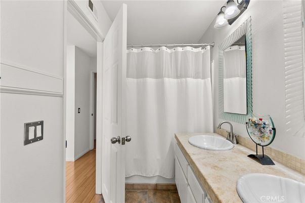 Bathroom, Dual Sink Vanities, Interior, Tile Countertops, Wood Texture Flooring