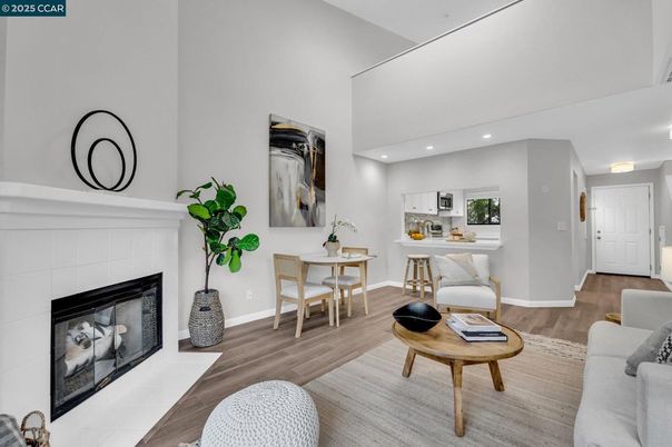 Dining room, Fireplace, Interior, Living room, Recessed Lighting, Wood Texture Flooring