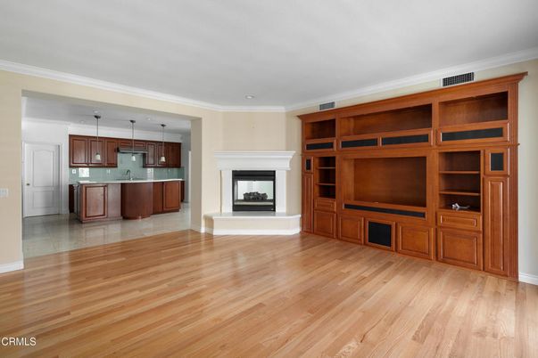 Empty room, Fireplace, Interior, Kitchen, Pendant Lights, Wood Texture Flooring