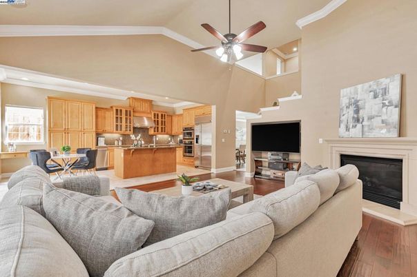 Fireplace, Interior, Kitchen, Living room, Recessed Lighting, Stainless Steel Appliances, Wood Texture Flooring