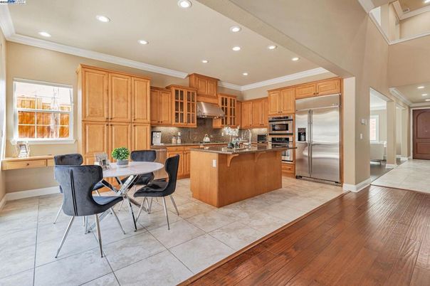 Dining room, Interior, Kitchen, Recessed Lighting, Stainless Steel Appliances, Wood Texture Flooring