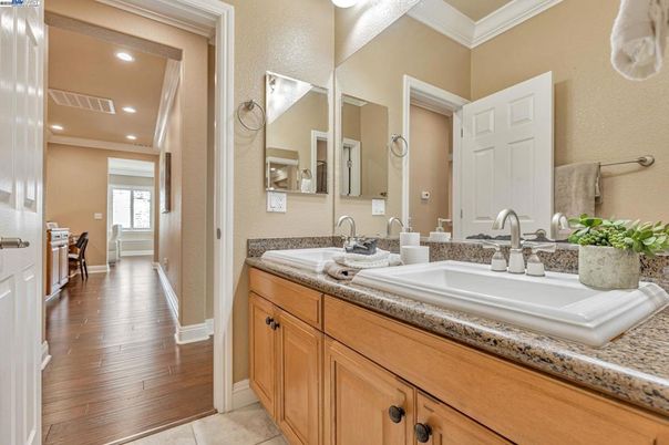 Bathroom, Dual Sink Vanities, Interior, Recessed Lighting, Wood Texture Flooring
