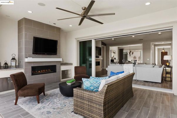 Dining room, Fireplace, Interior, Living room, Pendant Lights, Recessed Lighting, Wood Texture Flooring