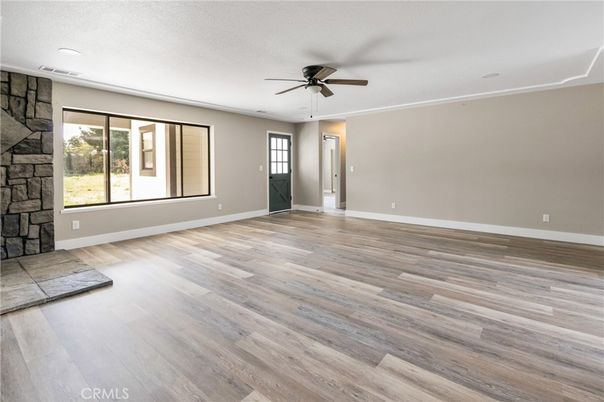 Empty room, Fireplace, Interior, Stone Walls, Wood Texture Flooring