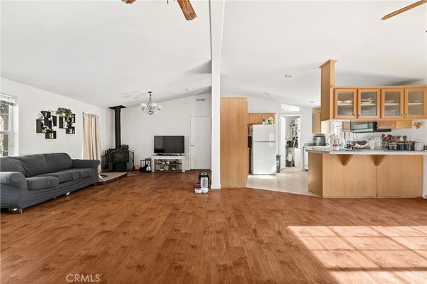 Chandelier, Fireplace, Interior, Kitchen, Recessed Lighting, Wood Texture Flooring
