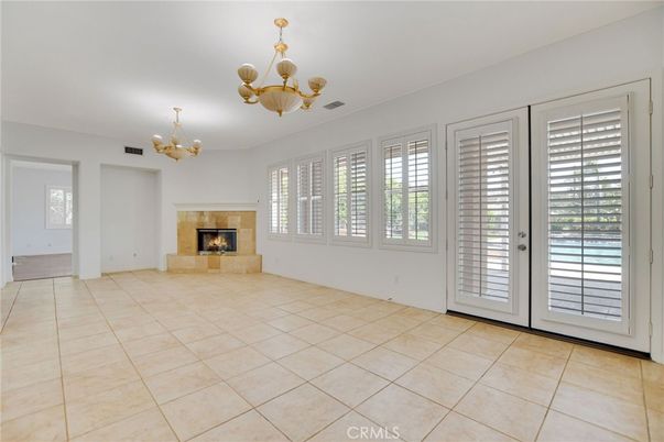 Chandelier, Empty room, Fireplace, Interior