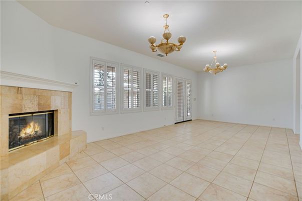 Chandelier, Empty room, Fireplace, Interior