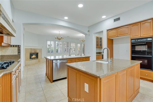 Chandelier, Fireplace, Interior, Kitchen, Recessed Lighting, Stainless Steel Appliances