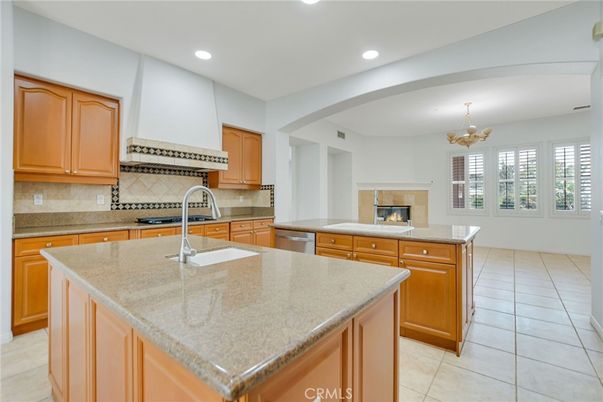 Chandelier, Fireplace, Interior, Kitchen, Recessed Lighting, Stainless Steel Appliances