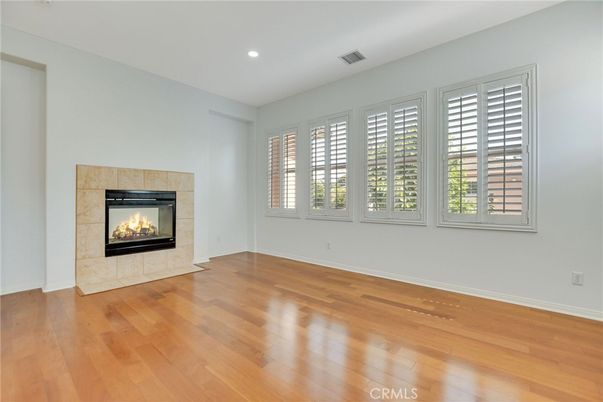 Empty room, Fireplace, Interior, Recessed Lighting, Wood Texture Flooring