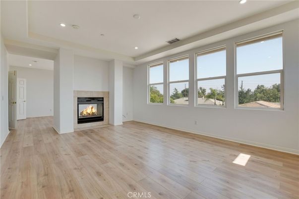 Empty room, Fireplace, Interior, Recessed Lighting, Wood Texture Flooring