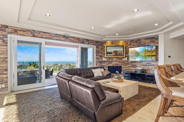 Fireplace, Interior, Living room, Recessed Lighting, Stone Walls, Water