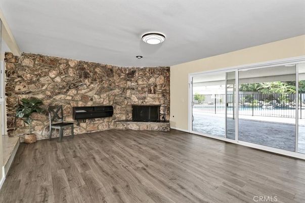 Empty room, Fireplace, Interior, Stone Walls, Wood Texture Flooring