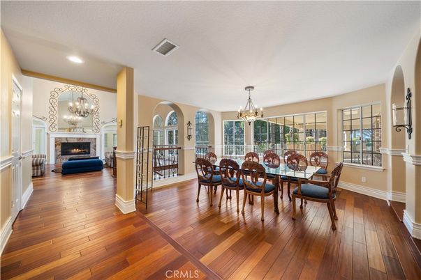 Chandelier, Dining room, Fireplace, Interior, Recessed Lighting, Wood Texture Flooring