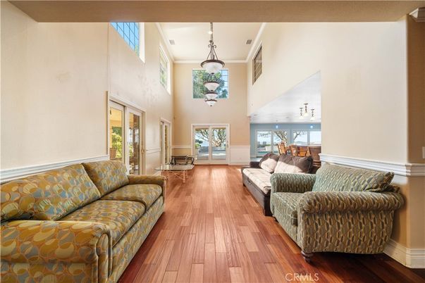Dining room, Fireplace, Interior, Living room, Recessed Lighting, Wood Texture Flooring