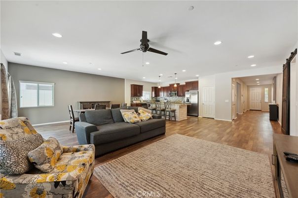 Dining room, Interior, Kitchen, Living room, Pendant Lights, Recessed Lighting, Stainless Steel Appliances, Wood Texture Flooring