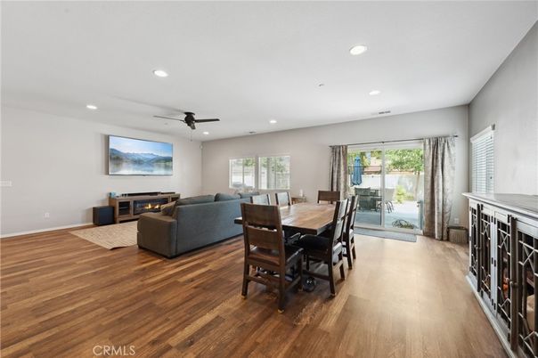 Dining room, Fireplace, Interior, Living room, Recessed Lighting, Wood Texture Flooring