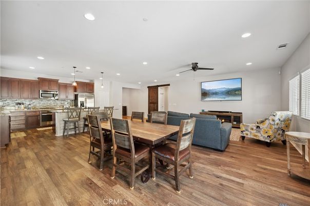 Dining room, Interior, Kitchen, Living room, Pendant Lights, Recessed Lighting, Stainless Steel Appliances, Wood Texture Flooring