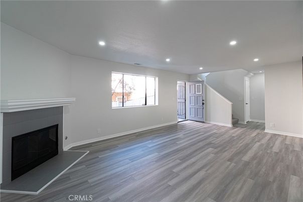 Empty room, Fireplace, Interior, Recessed Lighting, Wood Texture Flooring