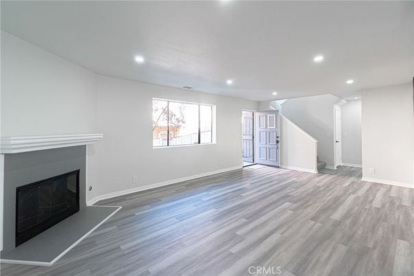 Empty room, Fireplace, Interior, Recessed Lighting, Wood Texture Flooring