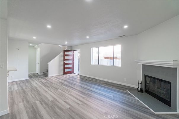 Empty room, Fireplace, Interior, Recessed Lighting, Wood Texture Flooring