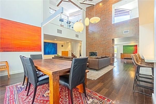 Dining room, Fireplace, Interior, Living room, Pendant Lights, Recessed Lighting, Stone Walls, Wood Texture Flooring